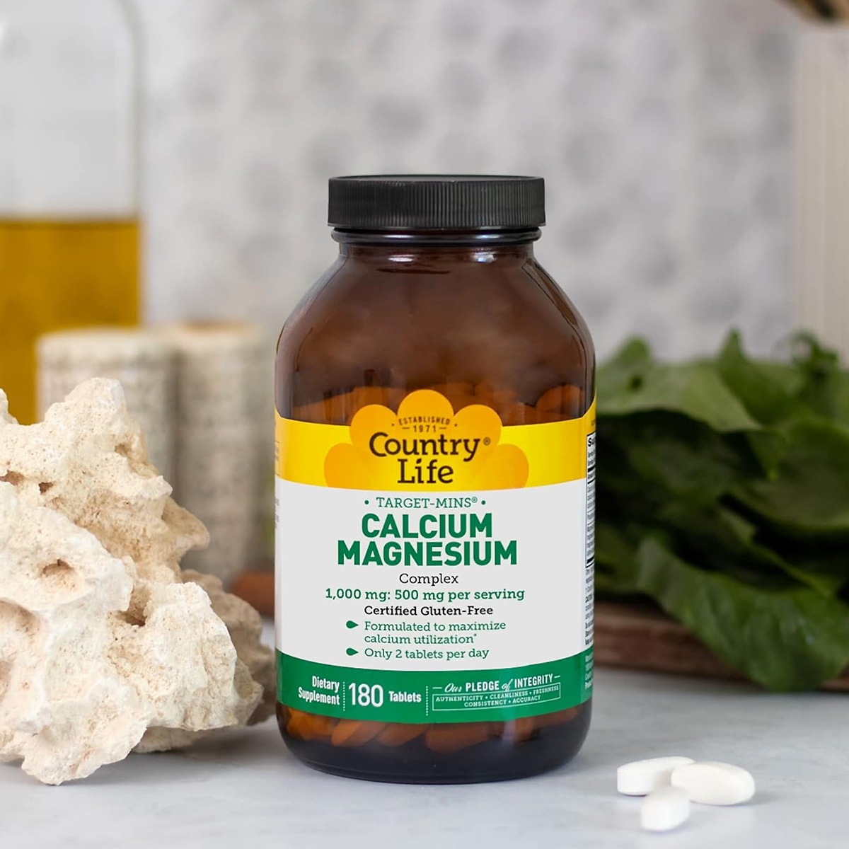 Country Life Target-Mins Calcium Magnesium Complex bottle, front label reading 1,000 mg calcium to 500 mg magnesium per serving, only 2 tablets per day
